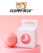 Load image into Gallery viewer, Floppy Fish Smart Ball for cats with motion sensor and USB charging, shown rolling on surface for interactive pet playtime.
